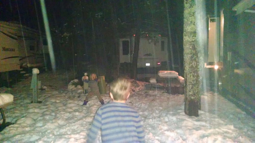 Kids loving the snow at our campsite in Gatlinburg!