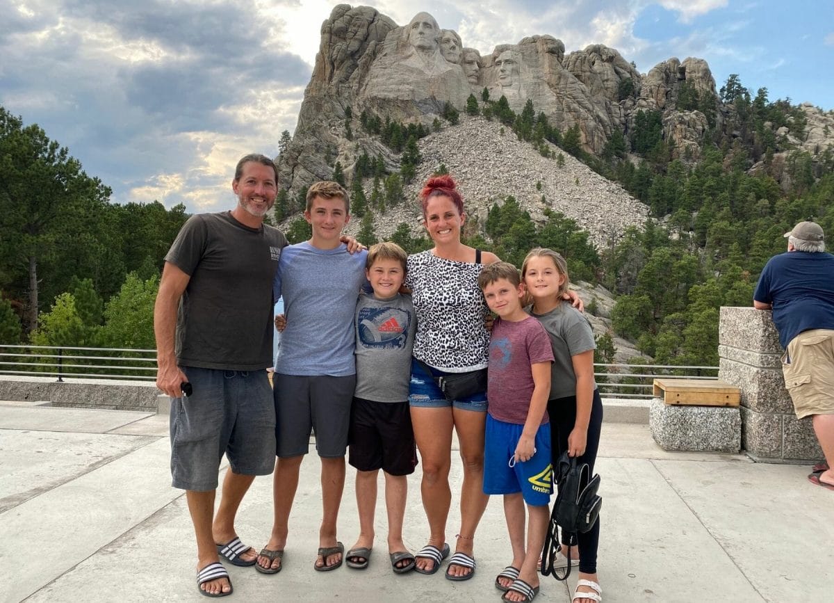 Family in front of Mt. Rushmore South Dakota Family Road Trip