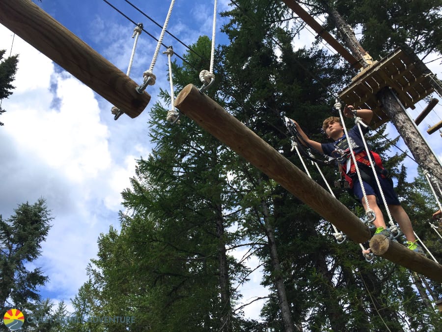 High up in the Aerial Adventure course is one of the best Whitefish Mountain Resort summer activities