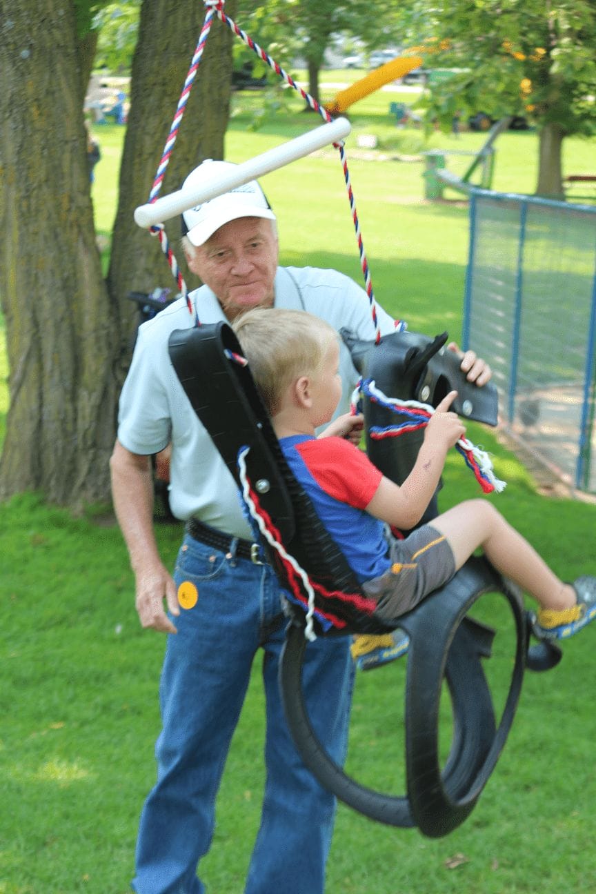 Kid on a swing at Green Meadows Farm