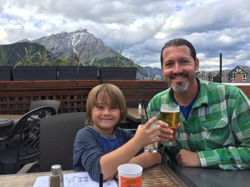 Cannon and Craig on a rooftop restaurant. 