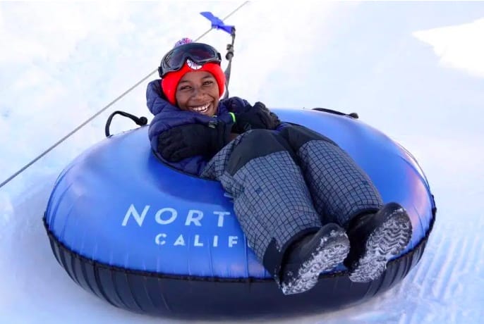 A kid snow tubing in NorthStar California, Best family ski resorts