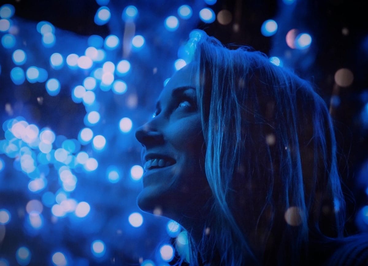 Woman looking at Christmas light in Wisconsin
