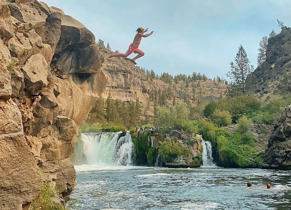 Kid cliff jumping at Steel Head Falls