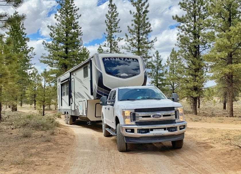 Driving our RV on a dirt road. 