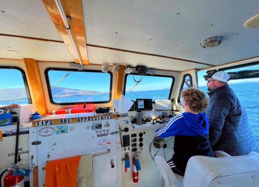 Cannon driving a Lobster Boat on the waters around Acadia National Park