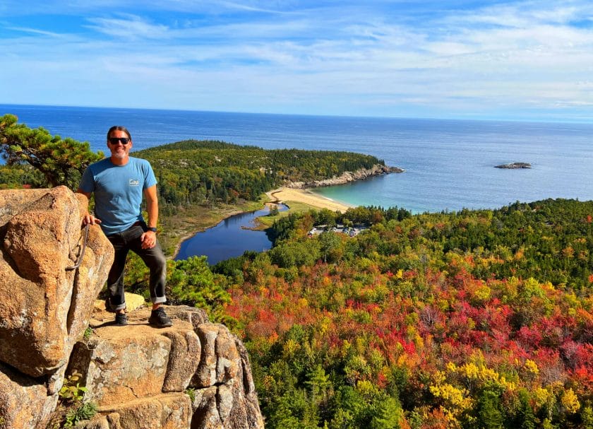 Acadia National Park, shows a man on an overlook point, East Coast Road Trip
