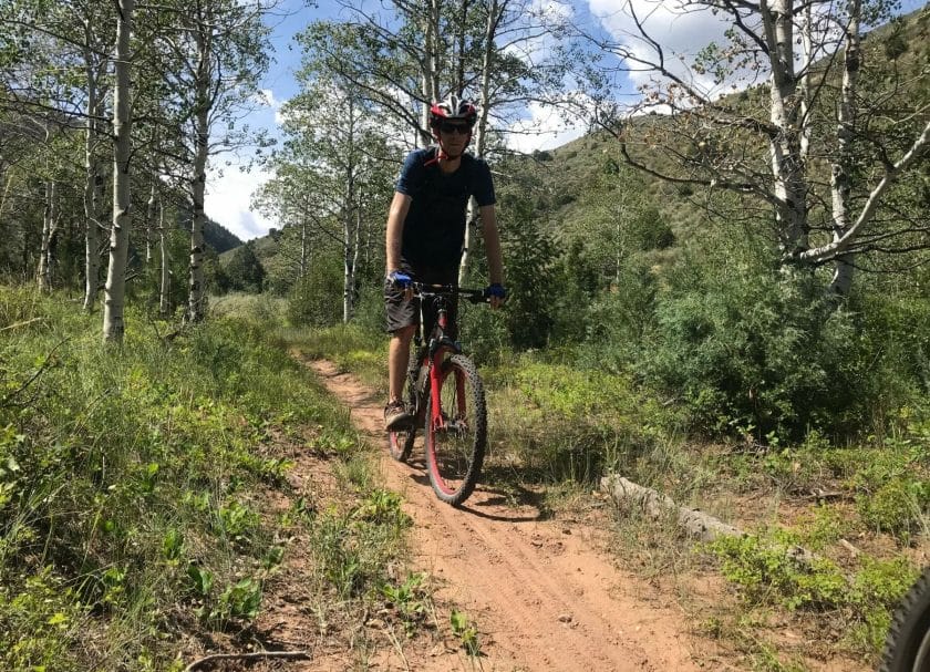 A man riding a bike at Dry Fork Flume Utah Mountain Biking