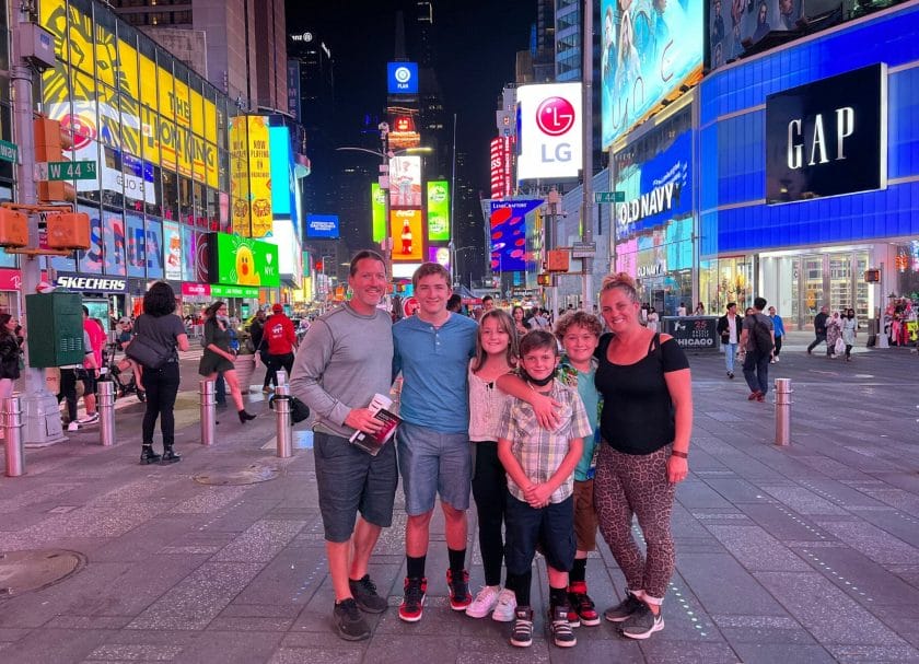 picture of a family in Times Square in NYC, East Coast Road Trip