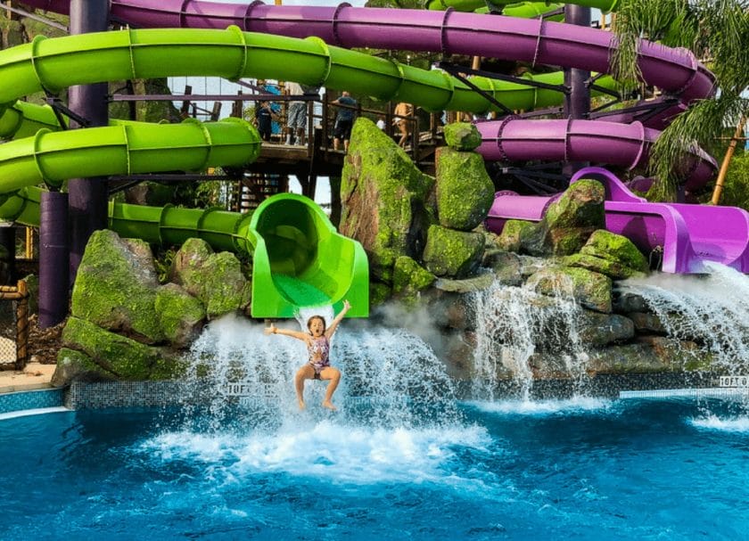 Picture of a girl going down the water slide at Volcano Bay, Things to do in Orlando