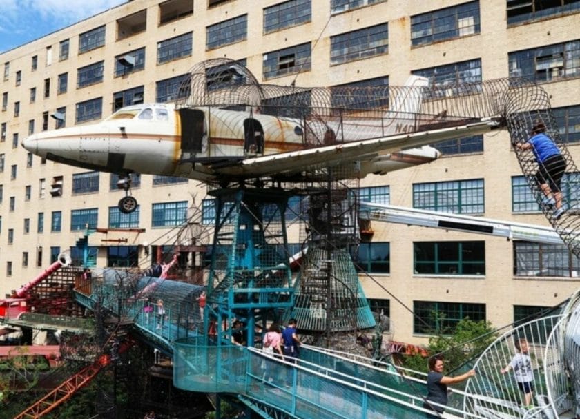 Climbing on a plane outside the building at the City Museum  St Louis