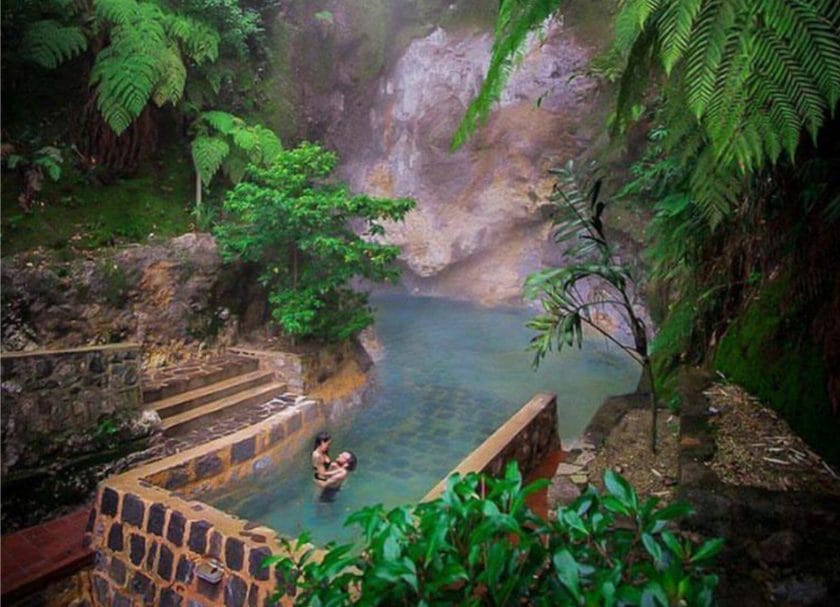 Picture of a couple in the hot springs of Fuentes Georginas, things to do in Guatemala