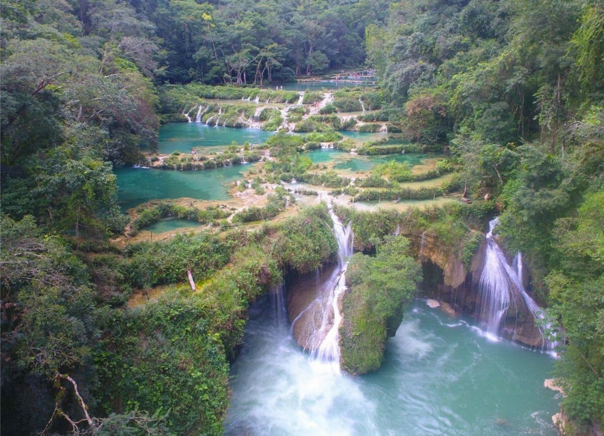 Picture of Semuc Champey National park and the turquoise waters and waterfalls, things to do in Guatemala.