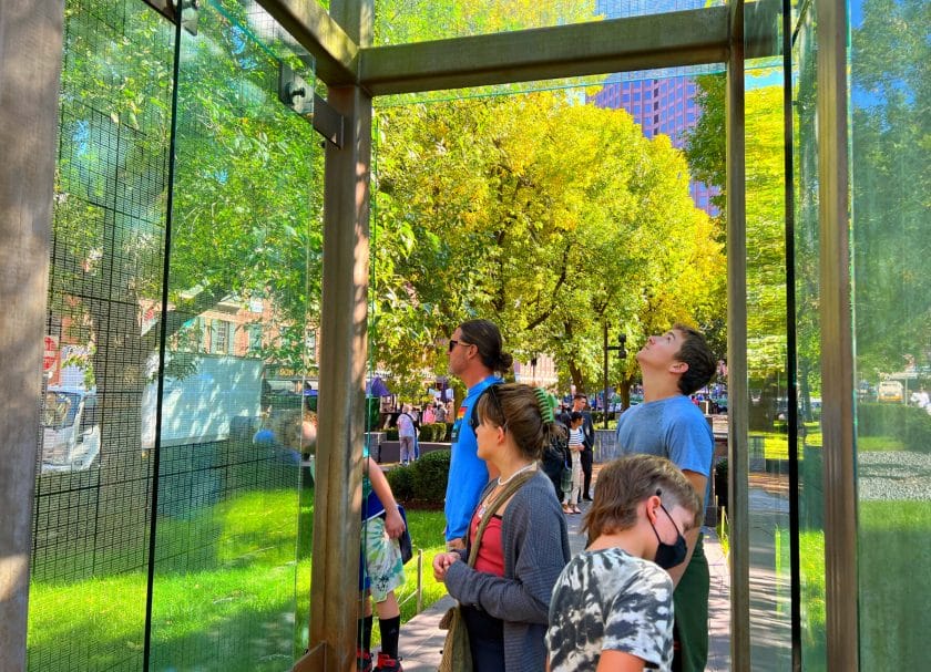 Standing in the Jewish Memorial while in Boston with kids