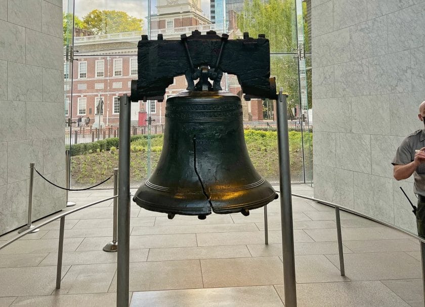 Shows the famous Liberty Bell with its crack.