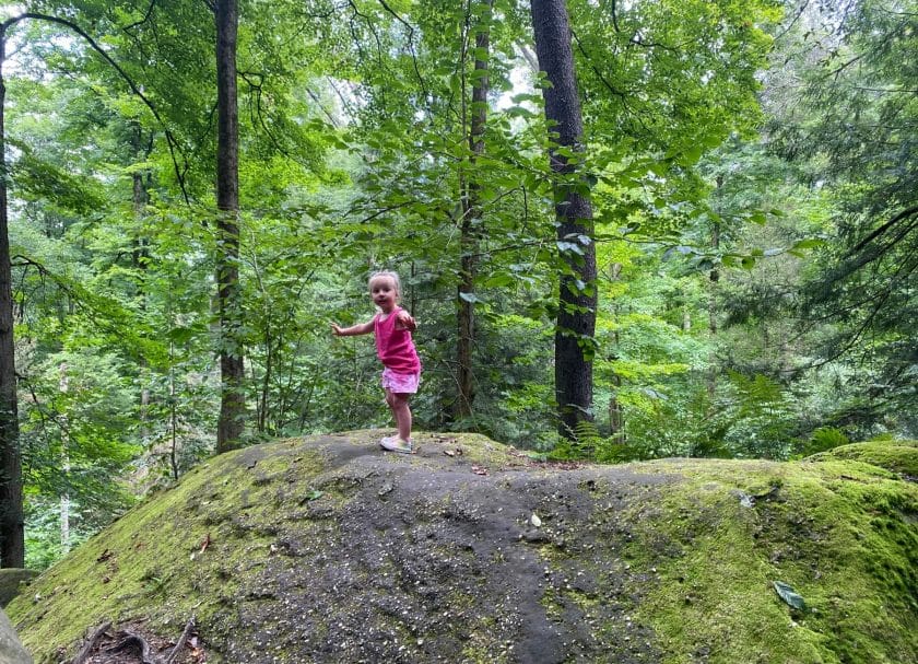 Picture of a little girl climbing on rockets at Ledges Trail, Things to do in Cuyahoga National Park