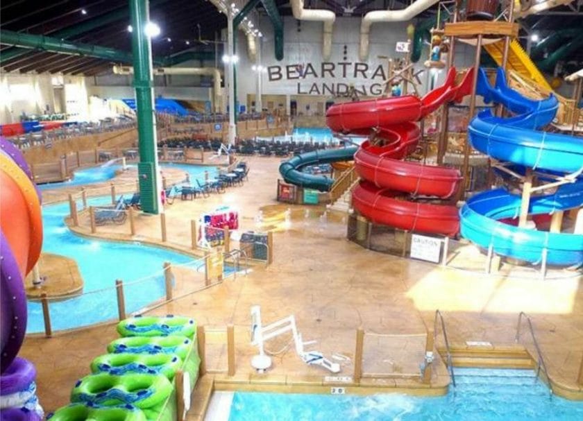 Shows multiple large water slides and the lazy river at Great Wolf Lodge in Wisconsin, indoor water parks Wisconsin 