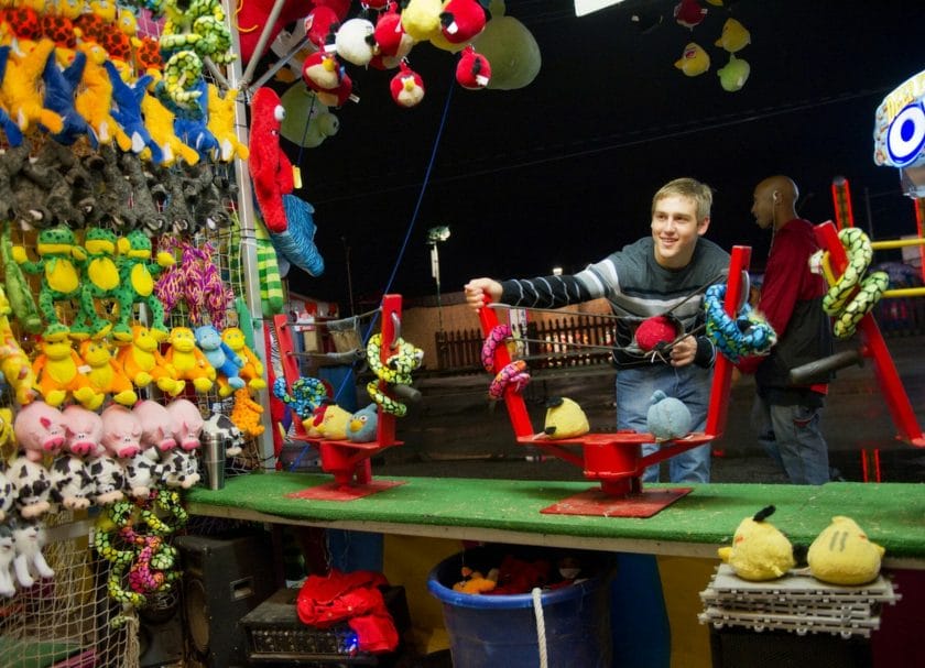 Shows a carnival game at Santa's Enchanted Village