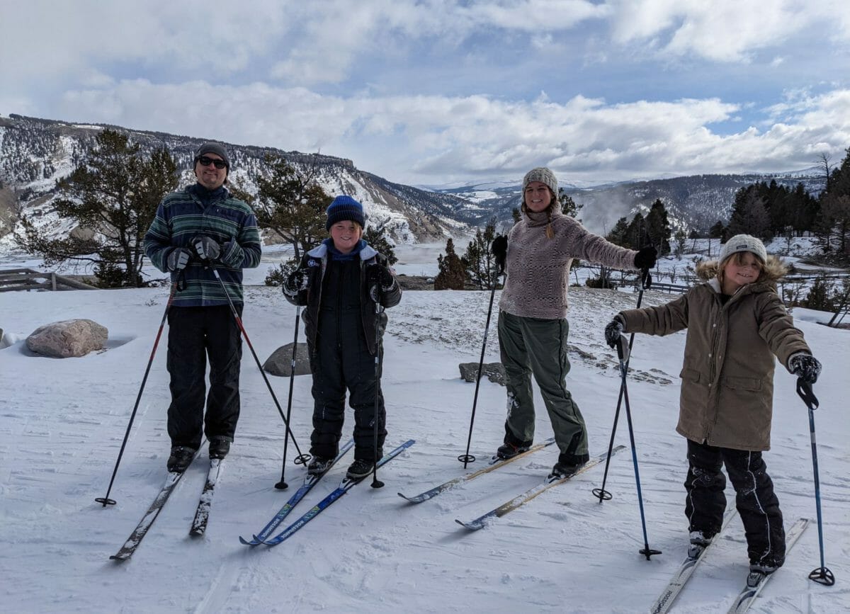A family skiing on the Upper Terrace Ski Loop, Yellowstone in Winter