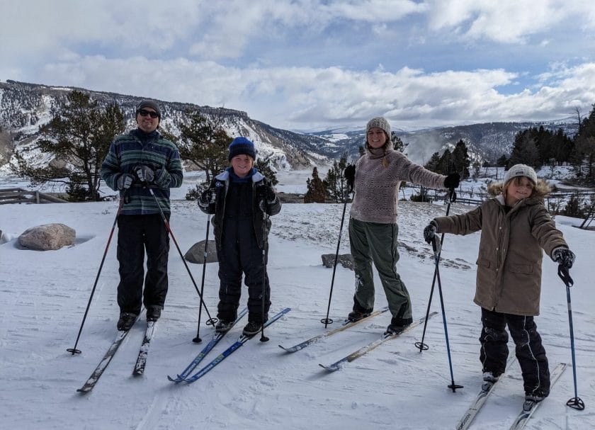 A family skiing on the Upper Terrace Ski Loop, Yellowstone in Winter