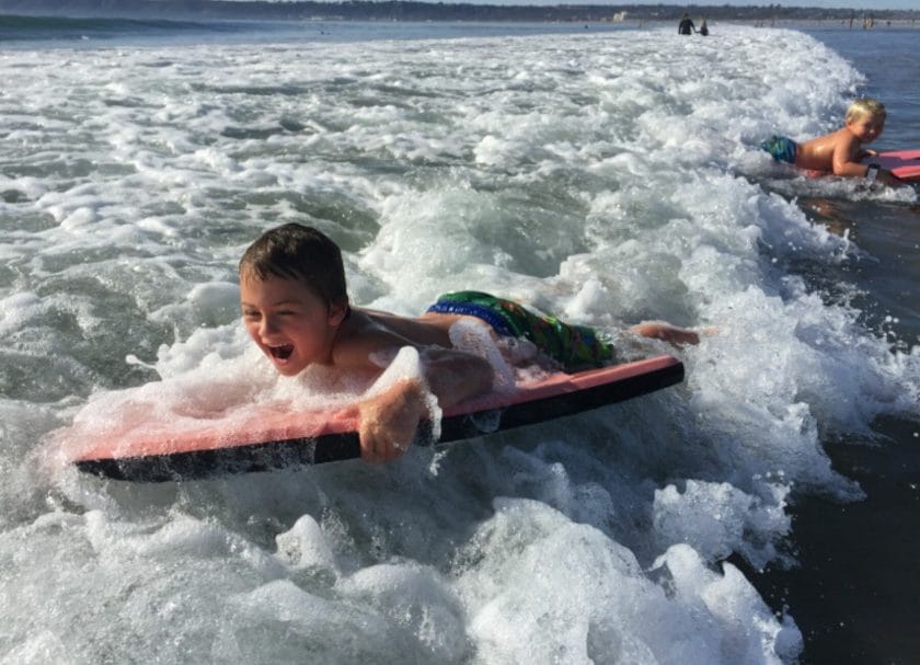 Riding on a body board at a San Diego Beach, Things to do in San Diego