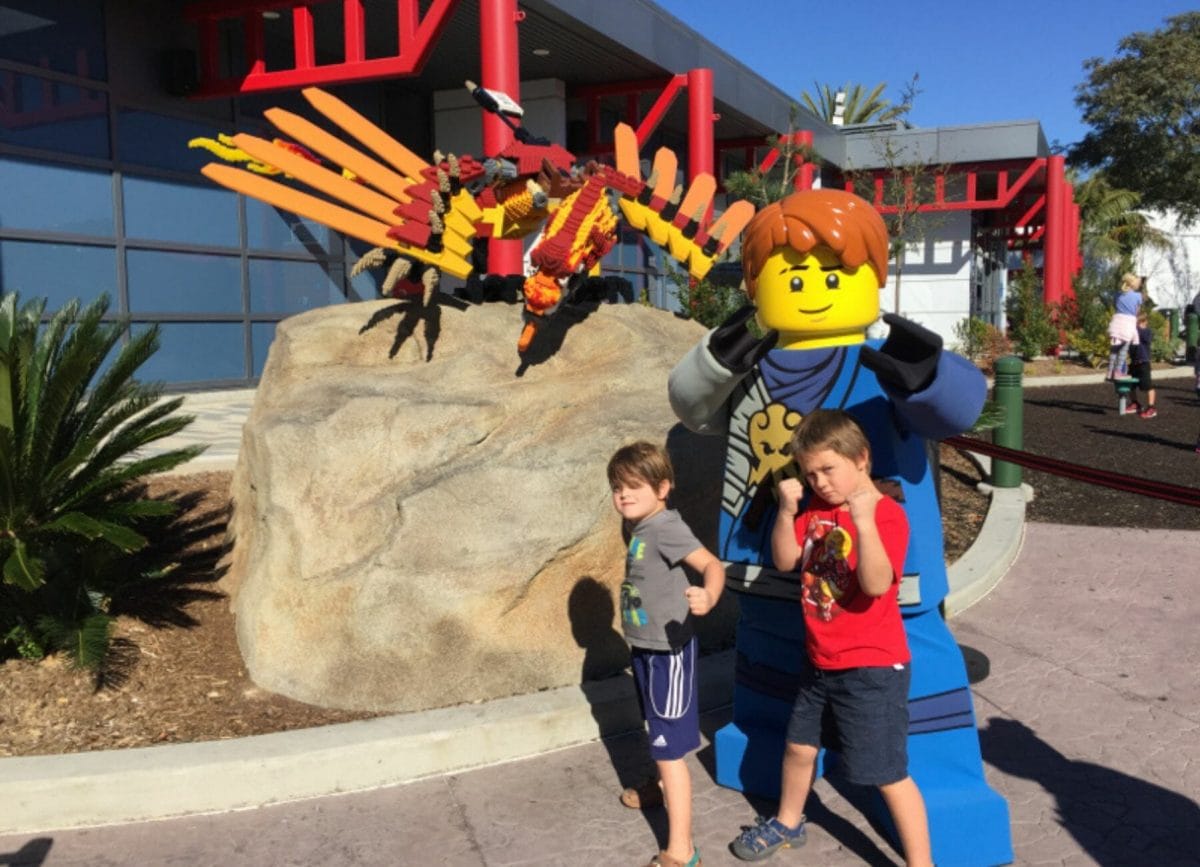 Shows 2 boys posing at Lego land, Day trips from San Diego