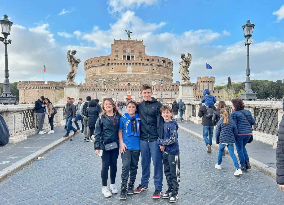 Kids standing in front of the Castel San't Angelo in Rome.