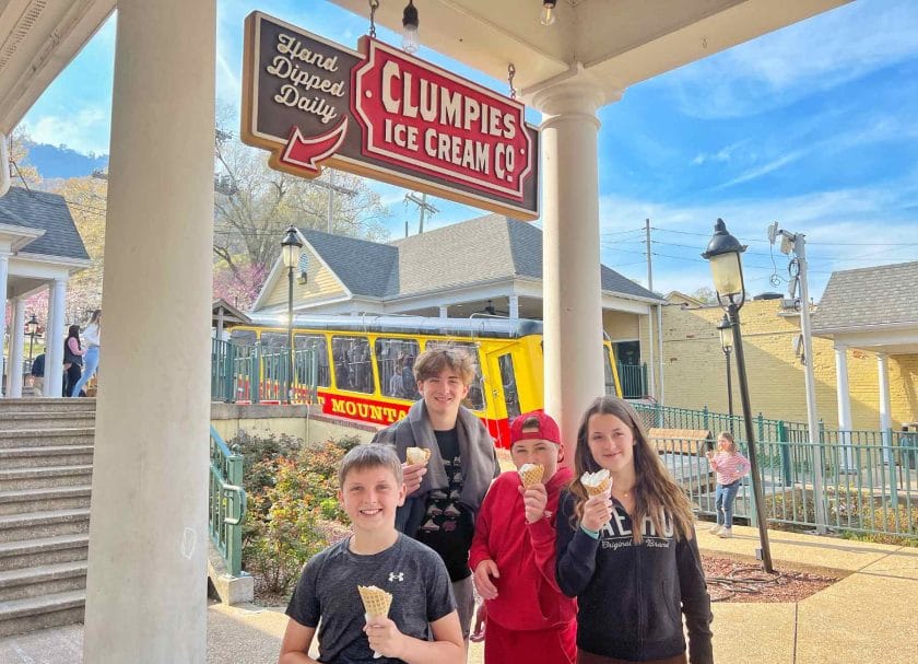 Kids eating ice cream under the Clumpies sign at the bottom of the Incline Railway in Chattanooga. 