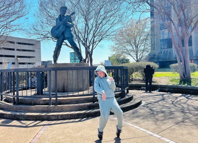 Knox striking a pose by the Elvis statue. 