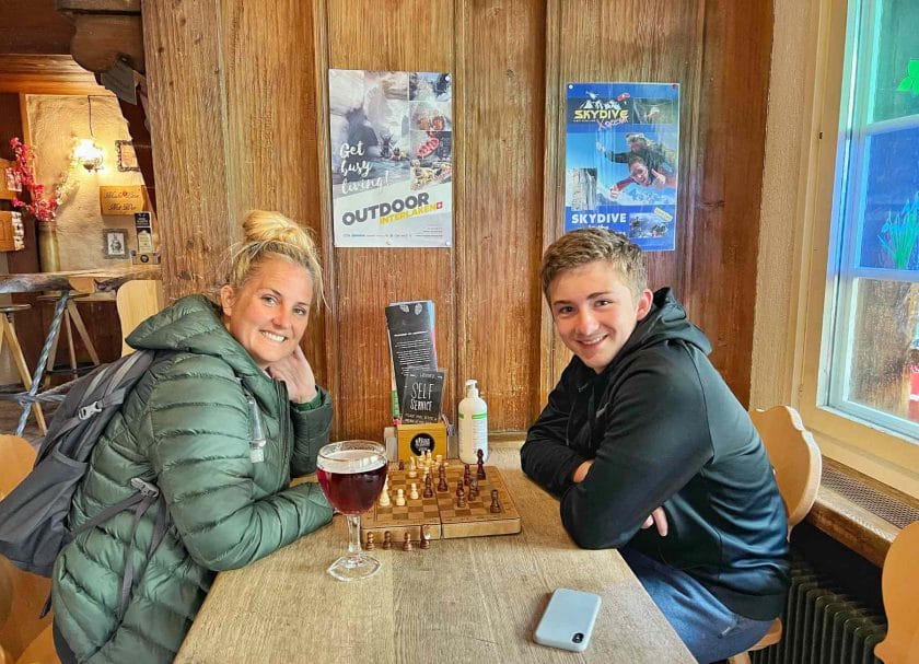 Playing chess with Carson at the Horner Pub In Lauterbrunnen.