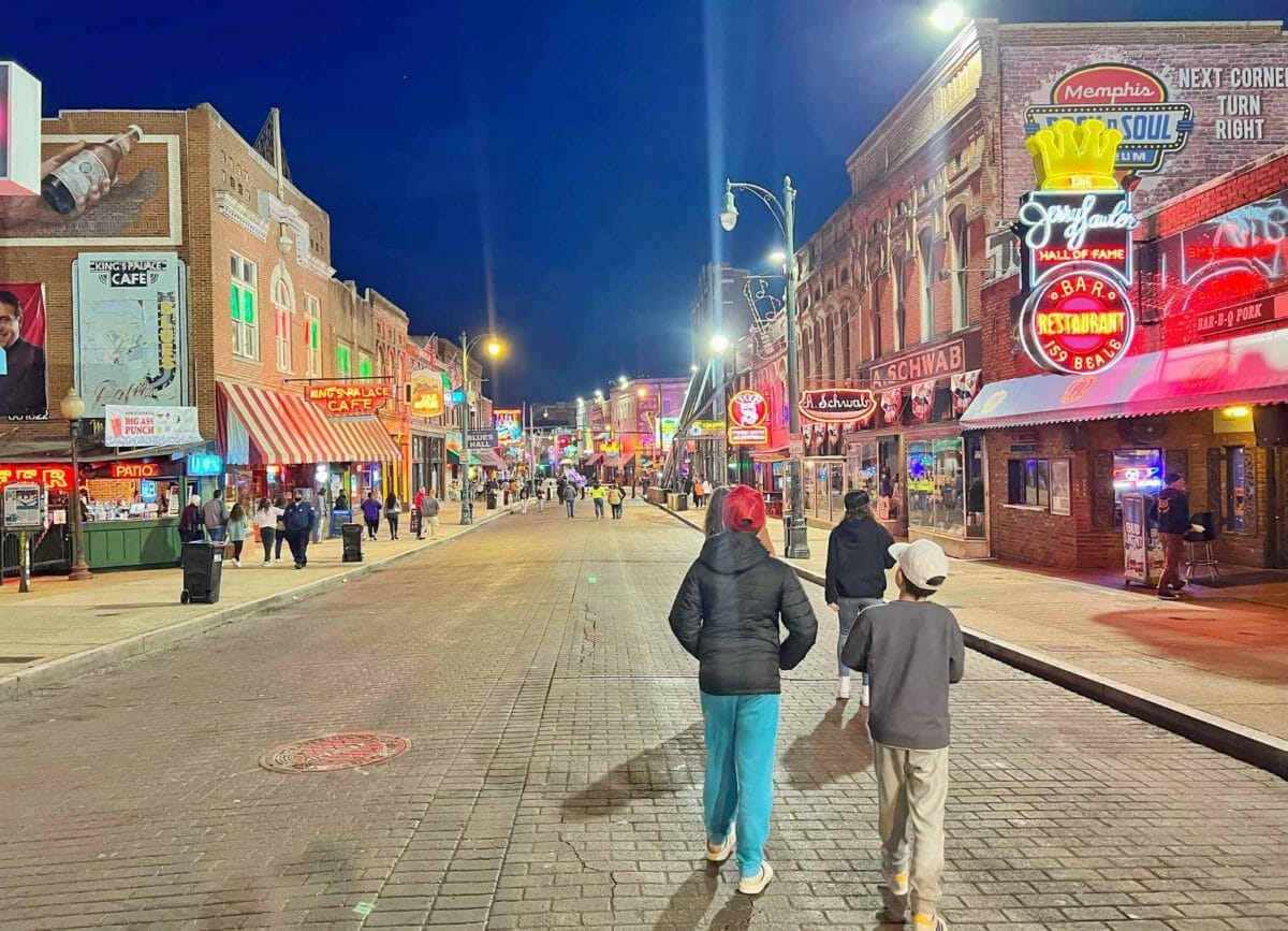 Walking down Beale Street at night.