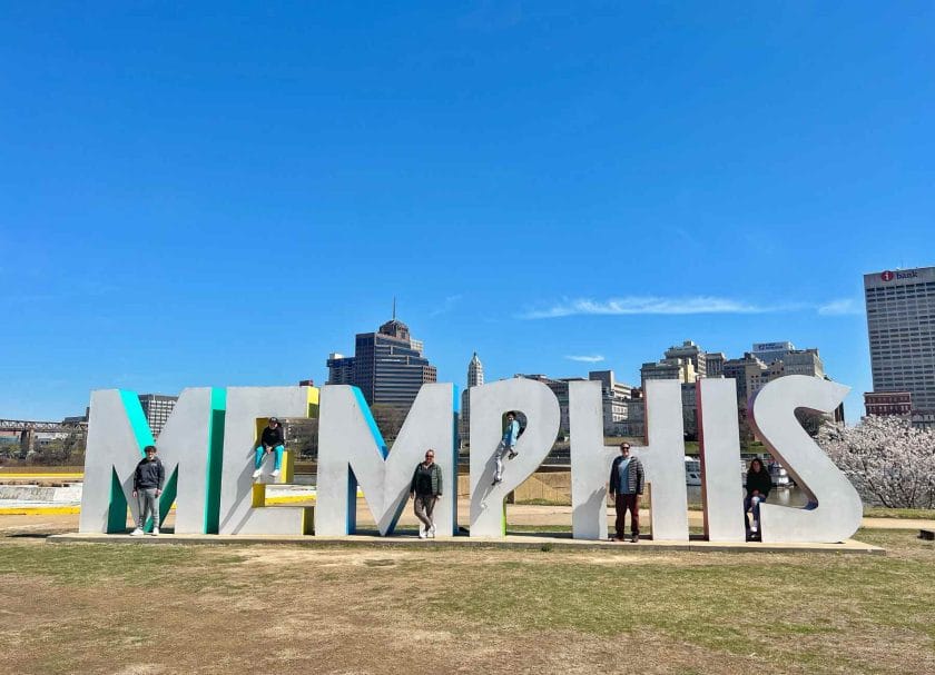 Our family standing by the Memphis sign on Mud Island. 