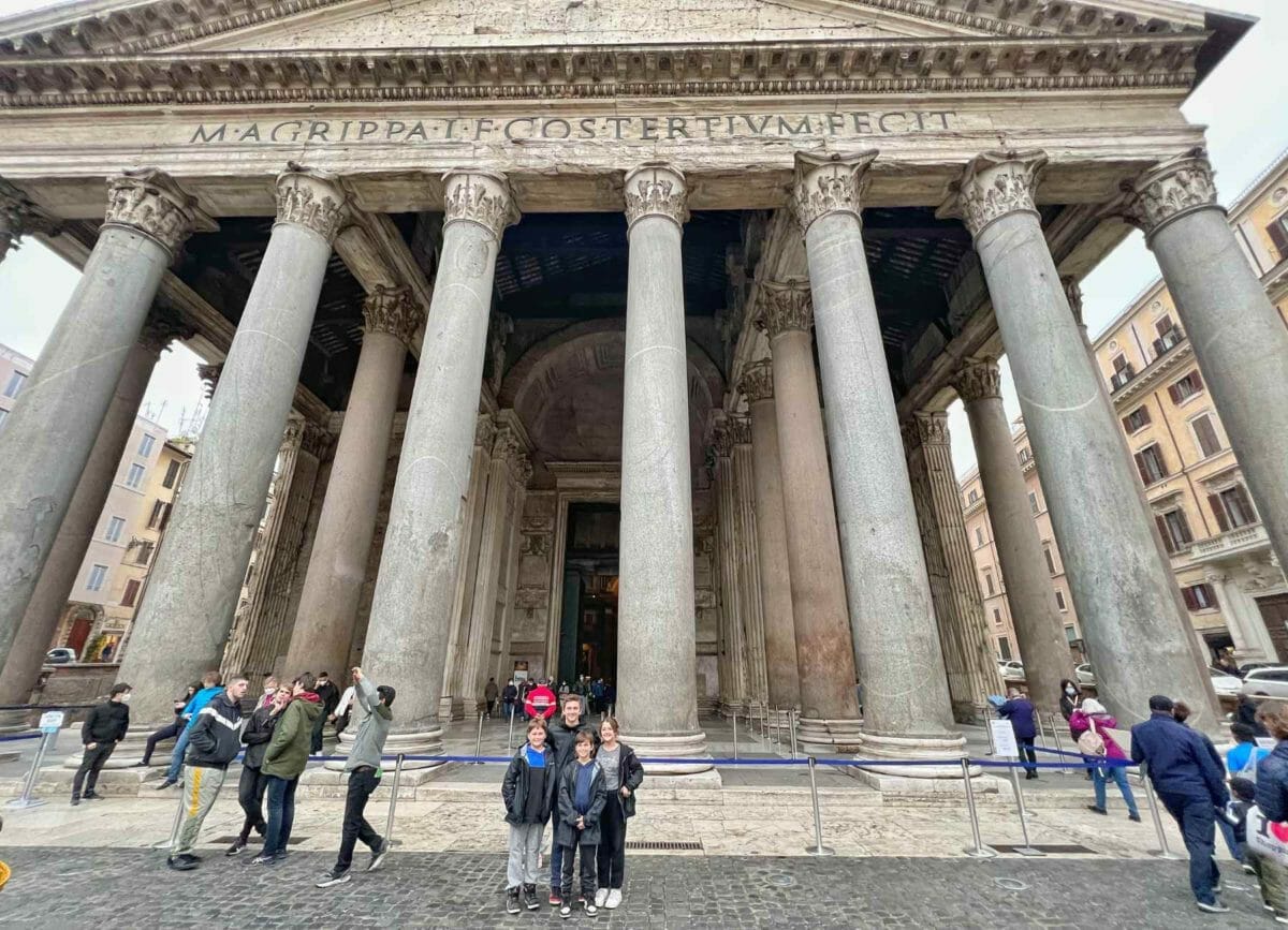 The kids in front of the Pantheon in Rome.