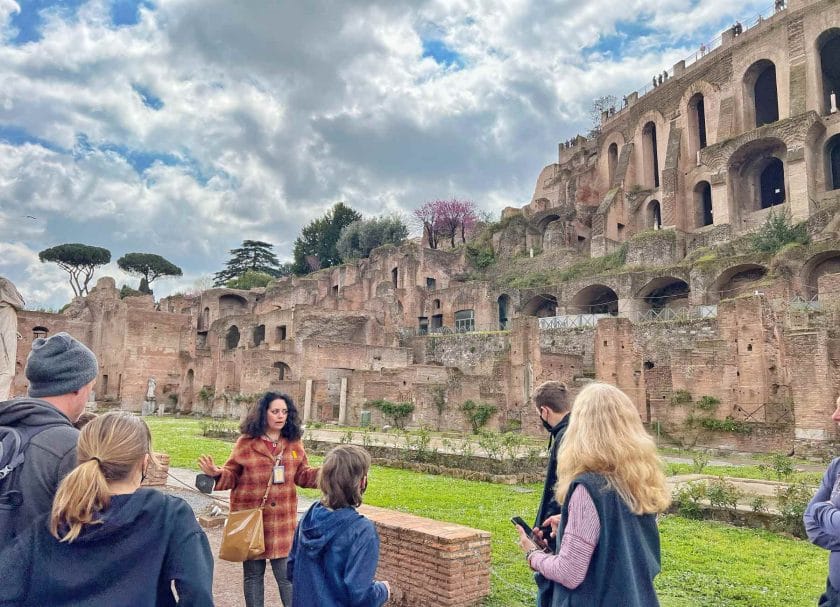 Listening to our tour guide at the Roman Forum. 