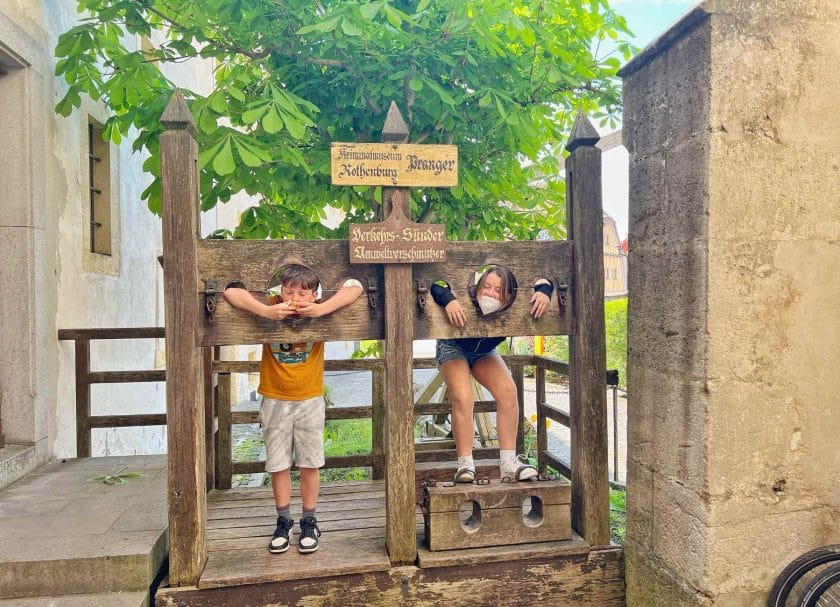 Knox and Melia at the Medieval Crime Museum in the Pillory.