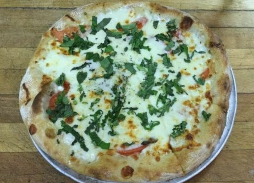 Shows a basil and tomato pizza from Bevacqua Reservoir Tavern in Boonton, New Jersey, Things to do in New Jersey