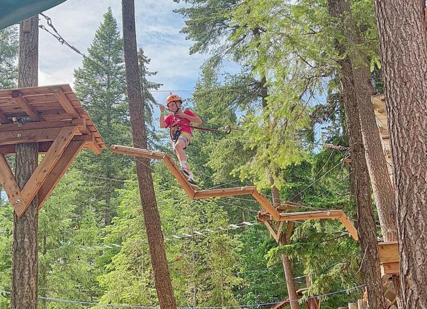 Knox on the ropes course at the golden skybridge.