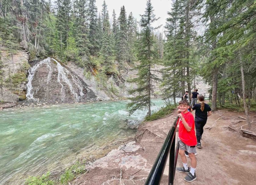 Malign Canyon Hike with Knox by one of the waterfalls