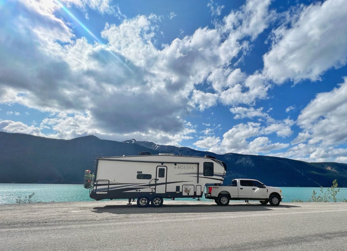 RV in front of Muncho Lake