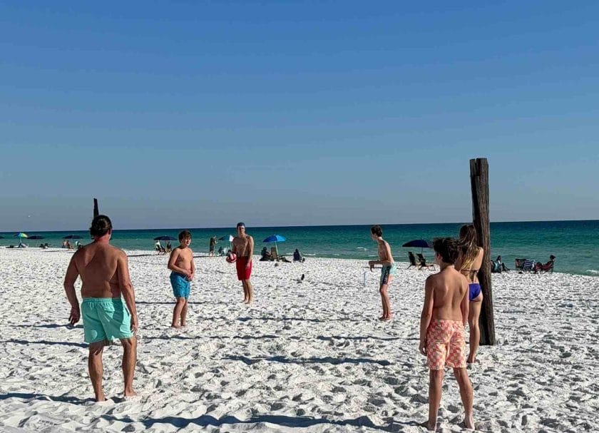 Playing volleyball on a makeshift course on the beach in Destin