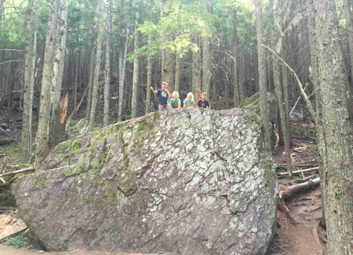 Climbing rocks on the Avalanche Lake hike in Glacier National Park