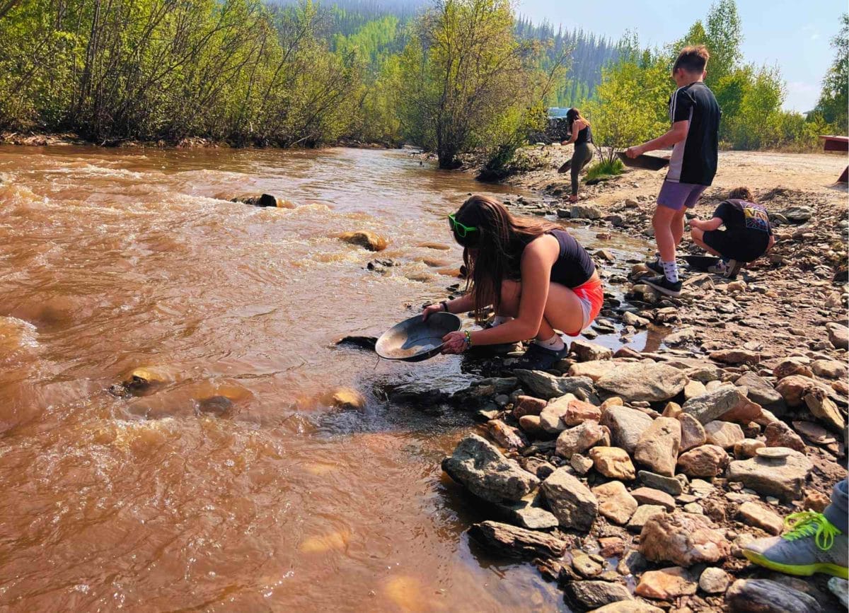 Melia panning for gold in Dawson City