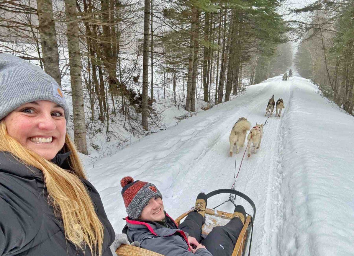 Picture of us dog sledding. A top thing to do in Quebec City!