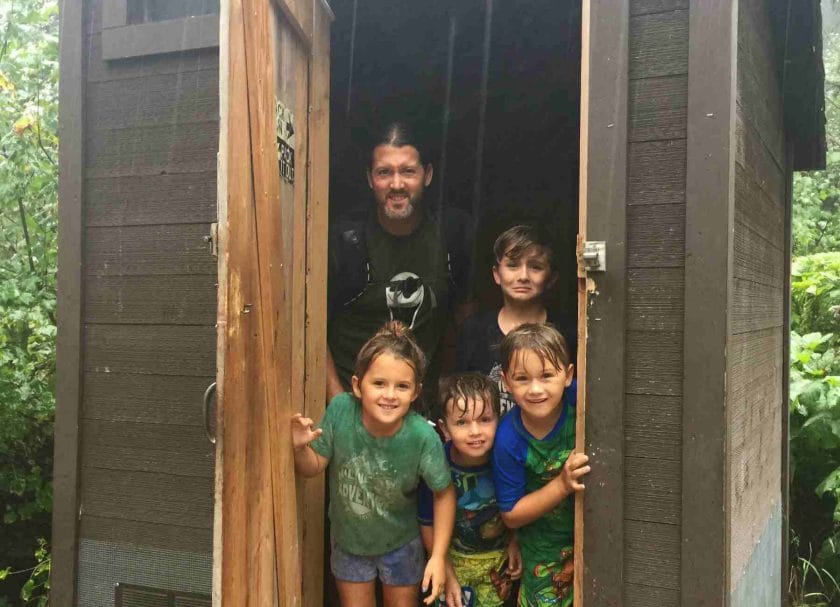 Our family in the Pit Toilet on the hike to Avalanche Lake Glacier National Park